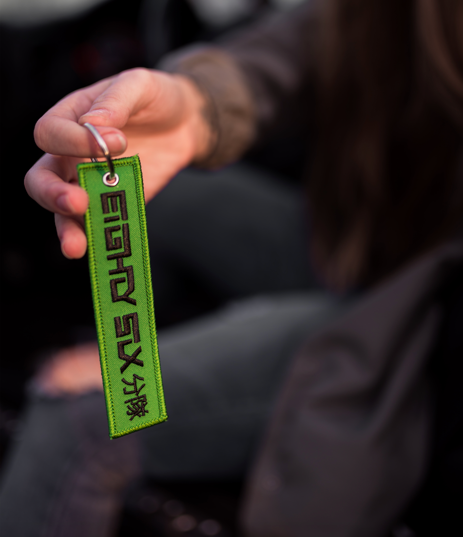 Green X Black Jet Tag